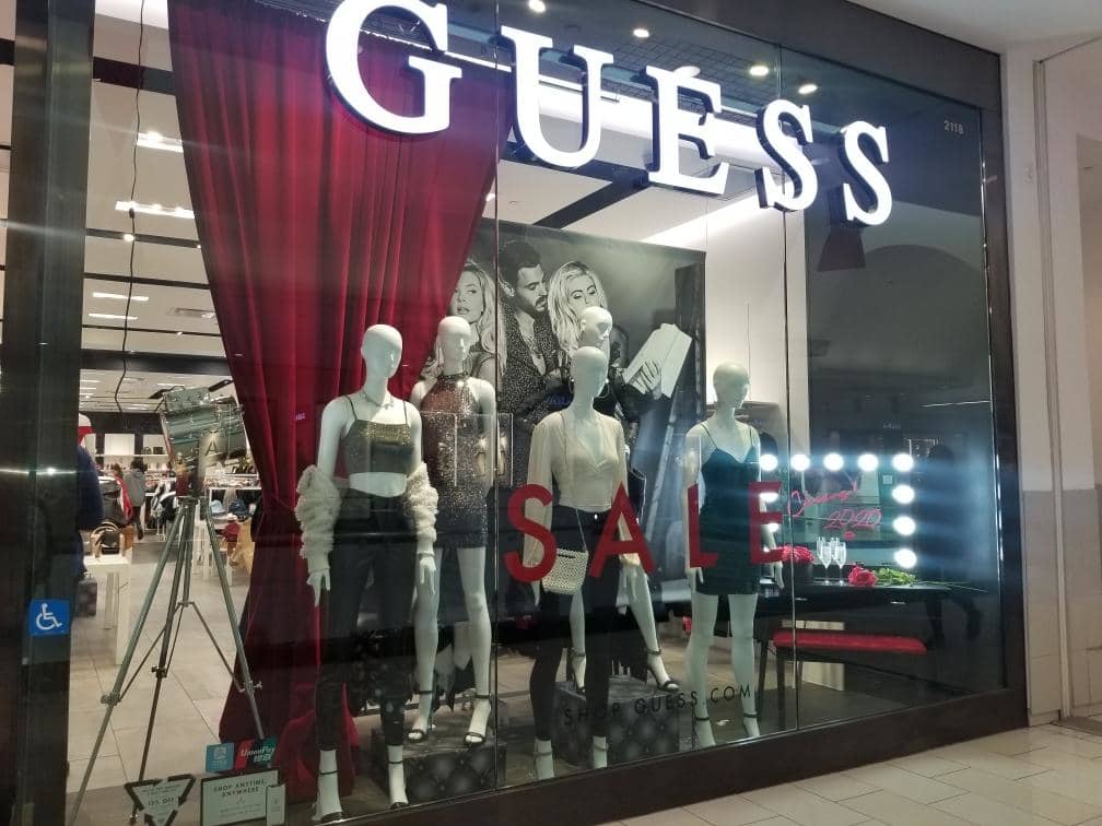 Cherry Red Flocked Velvet Curtain Window Backdrop Display at Guess Clothing Store